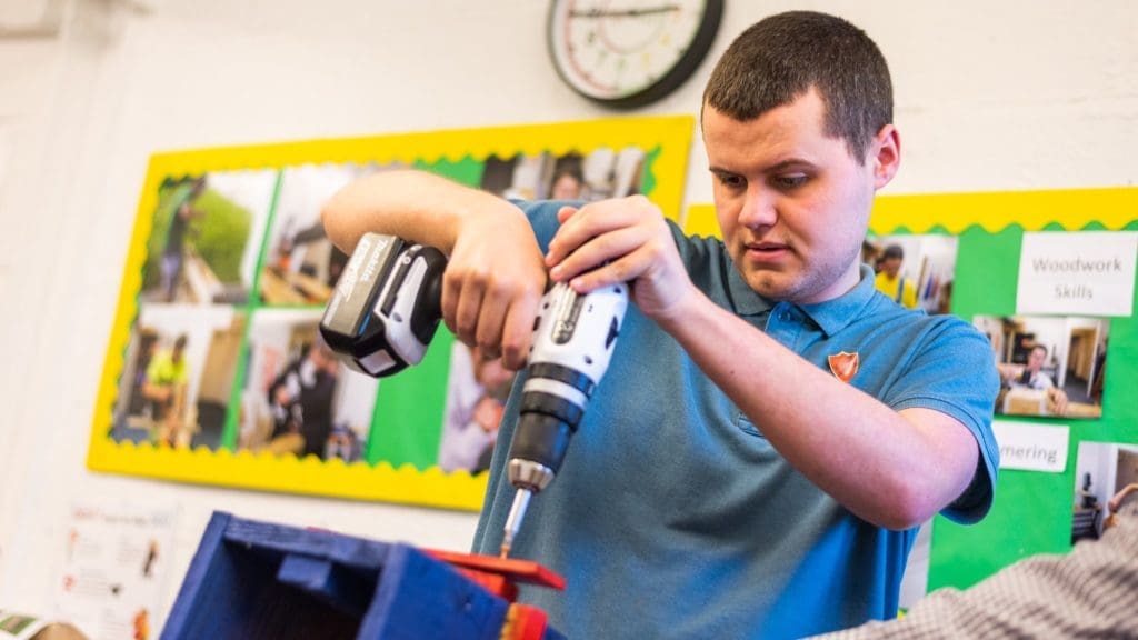 Lifeworks-College-student-doing-woodwork