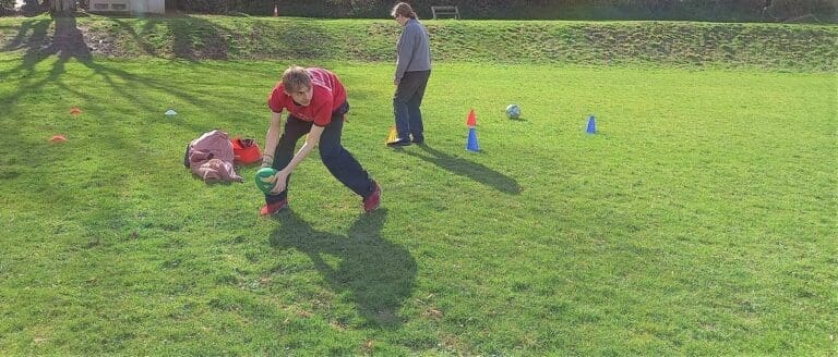 Lifeworks Saturday Club football and rugby game in beautiful weather